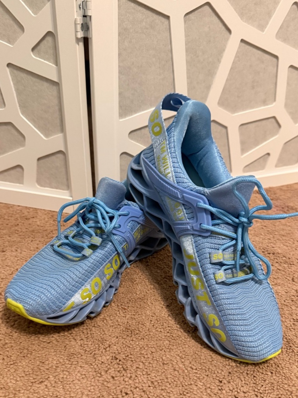 Nike Light Blue Athletic Shoes with Yellow Accents